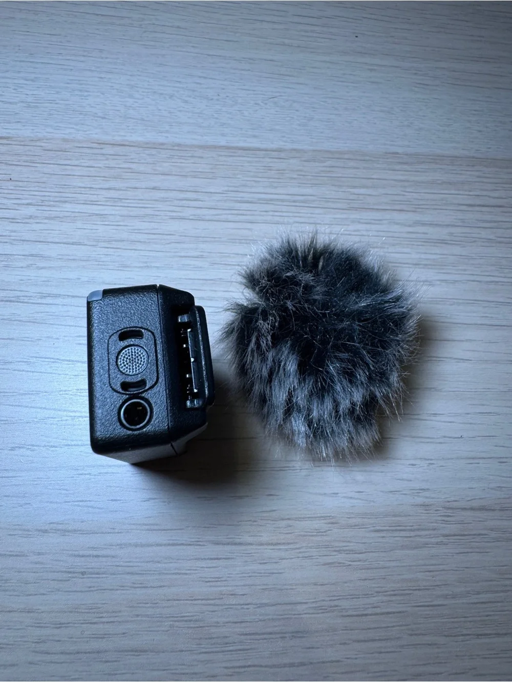 DJI Mic 1 transmitter and Gray Furry Wind Muff